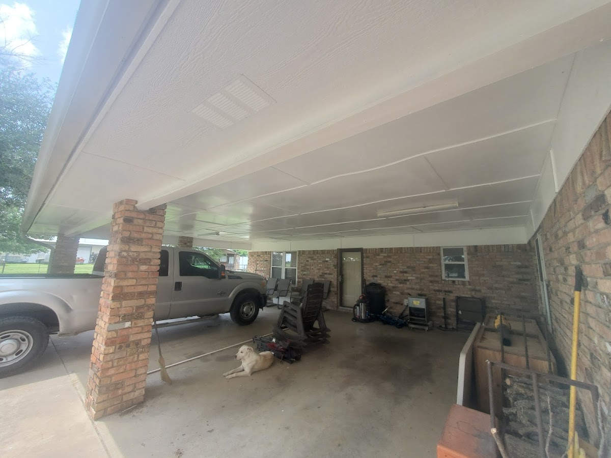 Finished covered carport with white ceiling