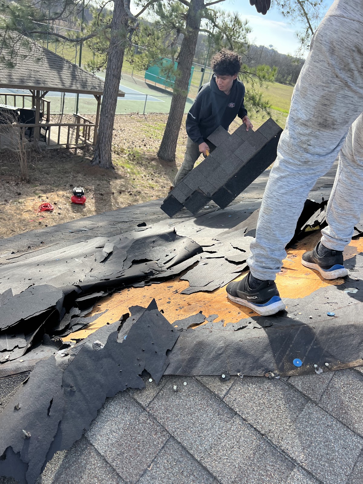 Sequoia Contractors crew removing old shingles